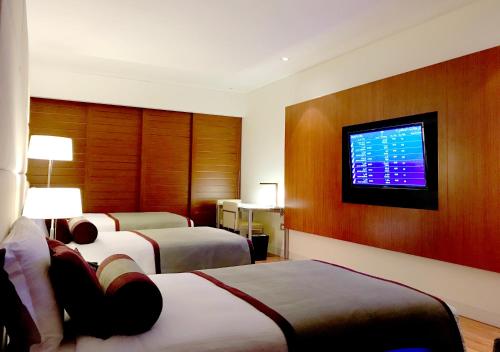 Habitación cuádruple del hotel Oryx Airport