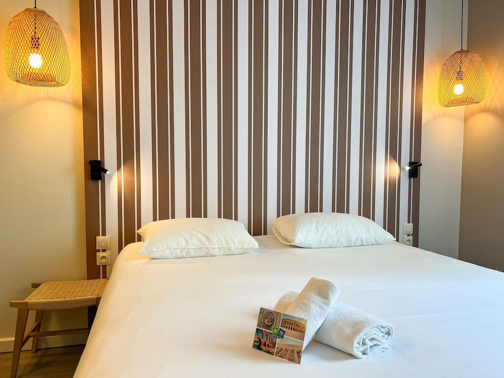 Habitación doble 1 Cama doble del hotel Ibis Styles Nimes Gare Centre. Foto 7