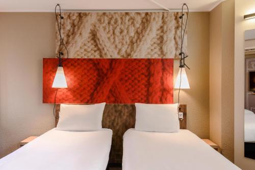 Habitación Doble Estándar - 2 camas del hotel Ibis Heidelberg Hauptbahnhof. Foto 2