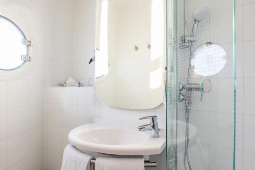 Habitación Doble Estándar - 2 camas del hotel Ibis Heidelberg Hauptbahnhof. Foto 3