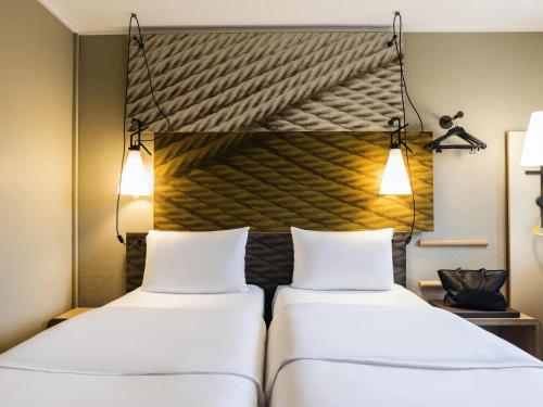 Habitación Doble Estándar - 2 camas del hotel Ibis Heidelberg Hauptbahnhof. Foto 6