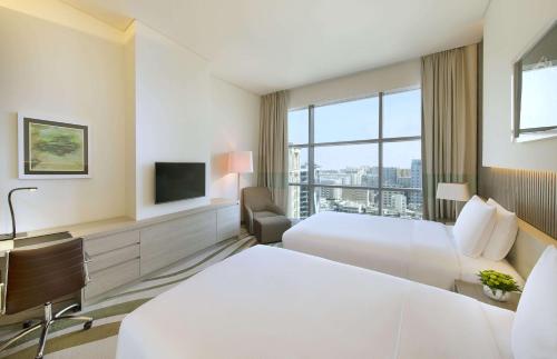 Habitación Familiar del hotel Doubletree By Hilton Doha Old Town. Foto 1