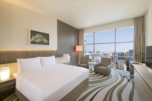 Habitación Familiar del hotel Doubletree By Hilton Doha Old Town. Foto 2