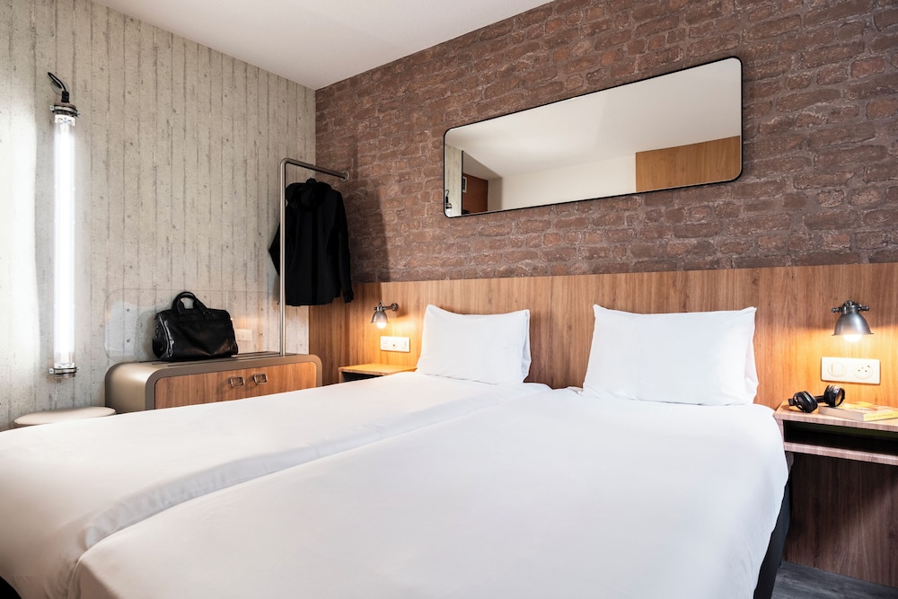 Habitación estándar con 2 camas individuales del hotel Ibis Styles Lyon Villeurbanne Parc De La Tête D'or. Foto 1