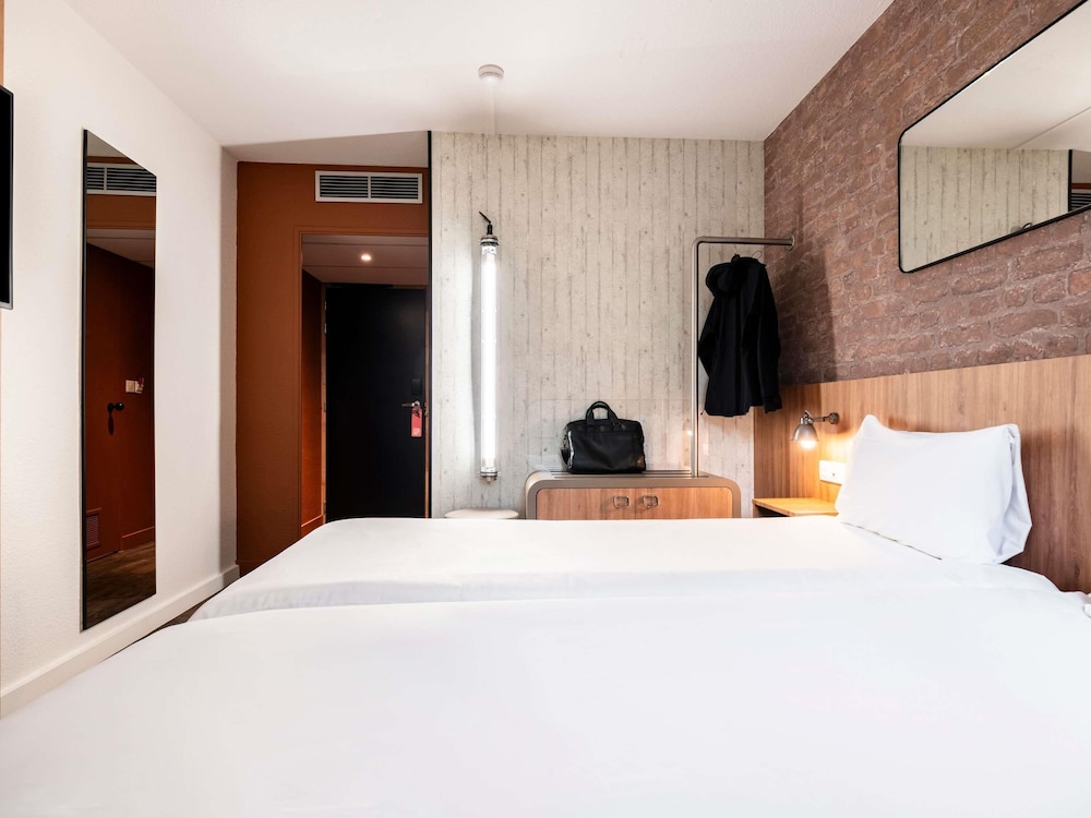 Habitación estándar con 2 camas individuales del hotel Ibis Styles Lyon Villeurbanne Parc De La Tête D'or. Foto 6