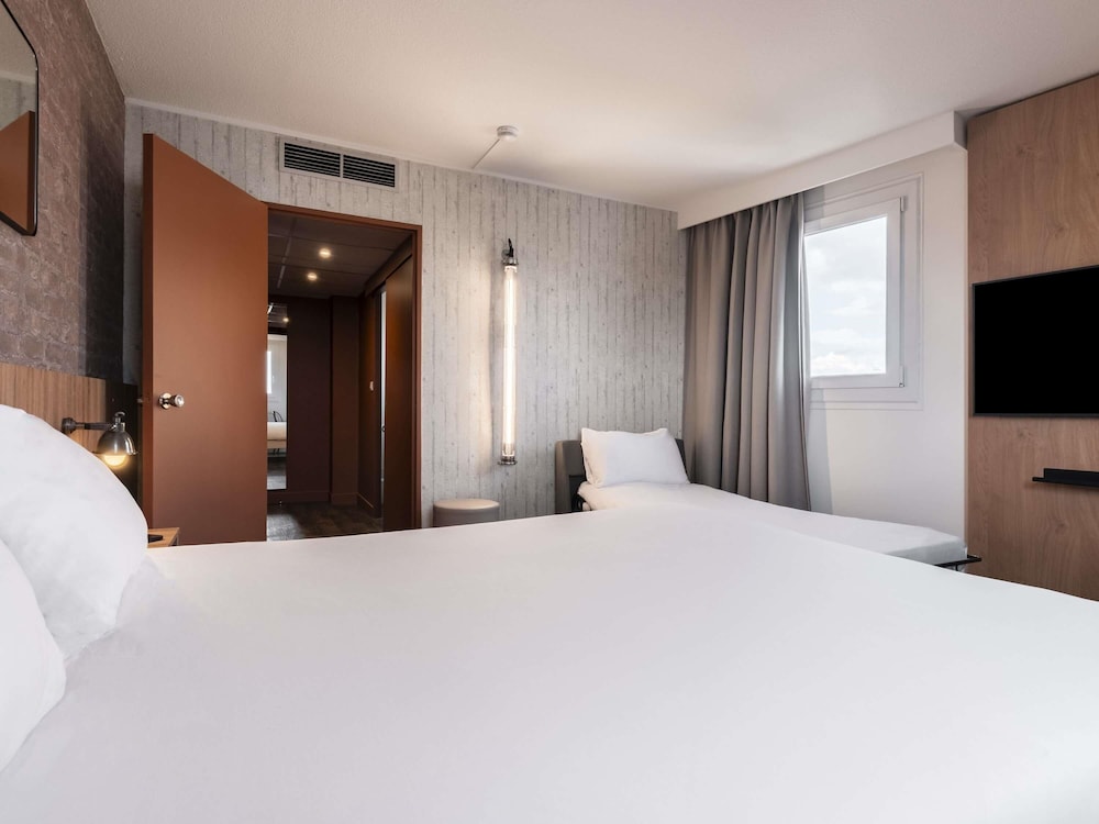 Habitación Superior con cama queen del hotel Ibis Styles Lyon Villeurbanne Parc De La Tête D'or. Foto 3