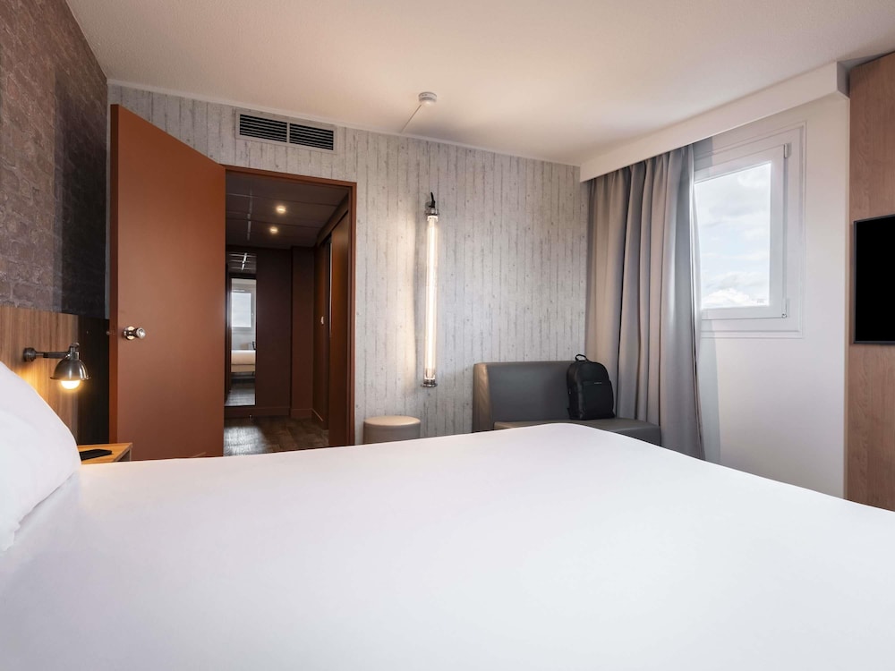 Habitación Superior con cama queen del hotel Ibis Styles Lyon Villeurbanne Parc De La Tête D'or. Foto 6