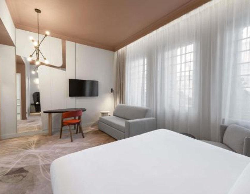 Habitación Doble Deluxe con Sofá del hotel Mövenpick Hotel Budapest Centre. Foto 10