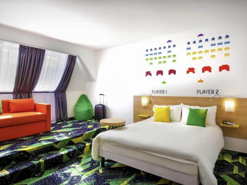 Habitación Familiar con sofá cama del hotel Ibis Styles Budapest Center. Foto 6