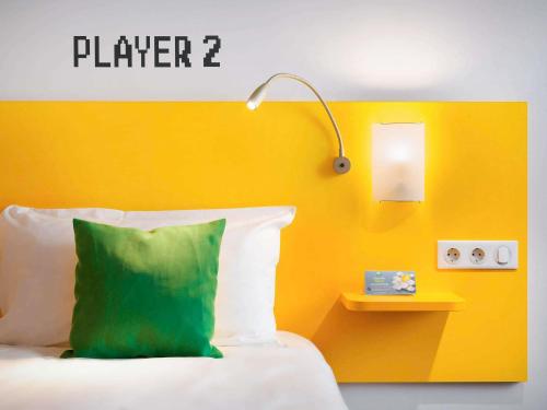 Habitación Familiar con sofá cama del hotel Ibis Styles Budapest Center. Foto 16