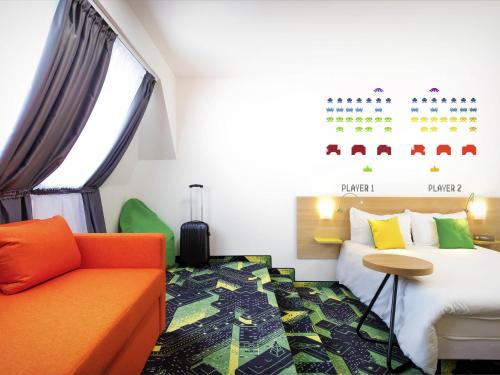 Habitación Familiar con sofá cama del hotel Ibis Styles Budapest Center. Foto 7