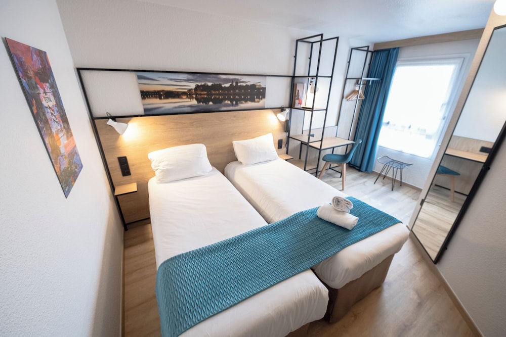 Habitación estándar con 2 camas individuales del hotel Ibis Avignon Centre Pont De L'europe. Foto 5
