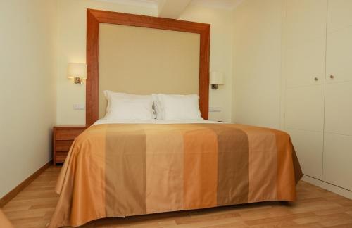 Suite con cama grande del hotel Lagoa Hotel. Foto 7