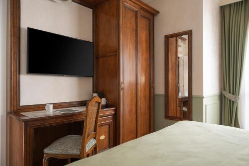 Habitación Triple Confort del hotel Adler Cavalieri. Foto 5