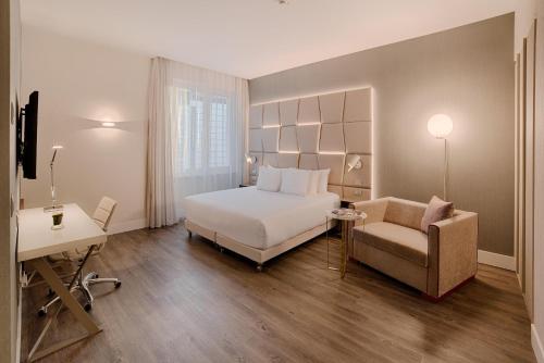 Habitación Doble Premium Grande - 1 o 2 camas del hotel NH COLLECTION ROMA PALAZZO CINQUECENTO. Foto 1