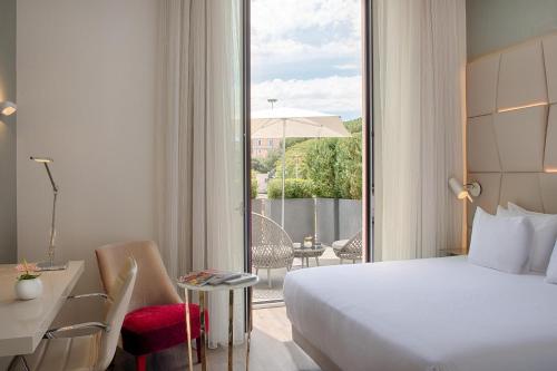 Habitación Doble Premium con terraza - 1 o 2 camas del hotel NH COLLECTION ROMA PALAZZO CINQUECENTO. Foto 4