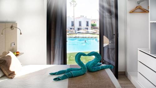 Bungalow con vistas a la piscina del hotel Fbc Fortuny Resort