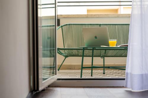 Habitación Triple Estándar con balcón del hotel Ripa Roma. Foto 3