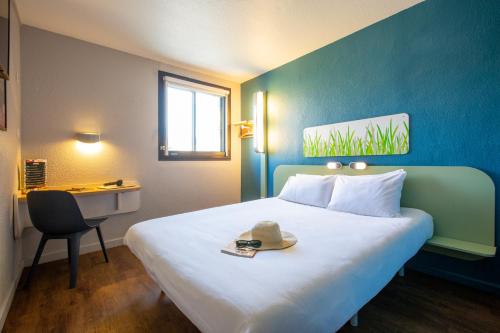 Habitación Doble con 2 camas individuales del hotel Ibis Budget Avignon Centre. Foto 1