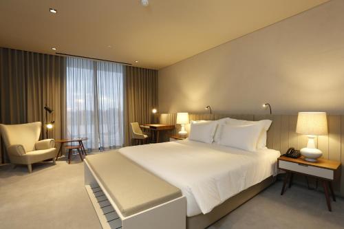 Habitación Individual con balcón del hotel Montebelo Vista Alegre Ílhavo. Foto 6