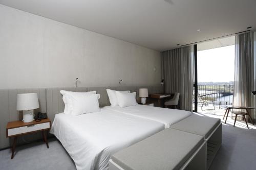 Habitación Individual con balcón del hotel Montebelo Vista Alegre Ílhavo. Foto 7