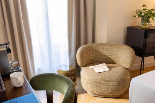 Habitación Deluxe con balcón del hotel Du Flaneur. Foto 1