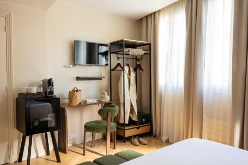 Habitación Triple del hotel Du Flaneur. Foto 1