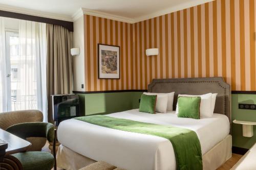 Habitación Deluxe con balcón del hotel Du Flaneur. Foto 4
