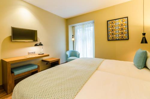 Habitación Doble Económica del hotel Vincci Liberdade. Foto 6
