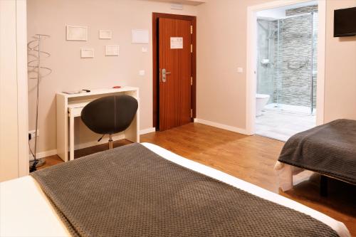 Habitación Triple del hotel Vivar. Foto 7