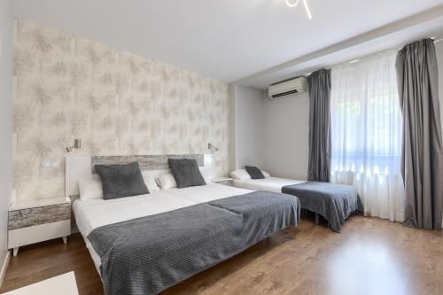Habitación Triple del hotel Vivar. Foto 9