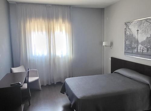 Habitación Doble del hotel T4. Foto 6