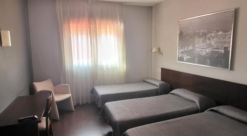 Habitación Triple del hotel T4. Foto 6
