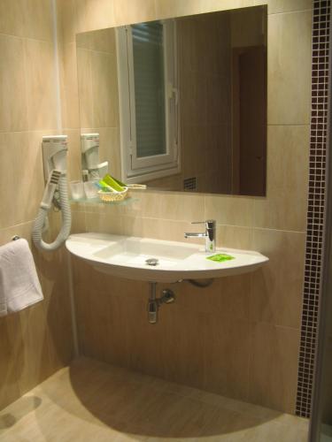 Habitación Triple del hotel T4. Foto 9