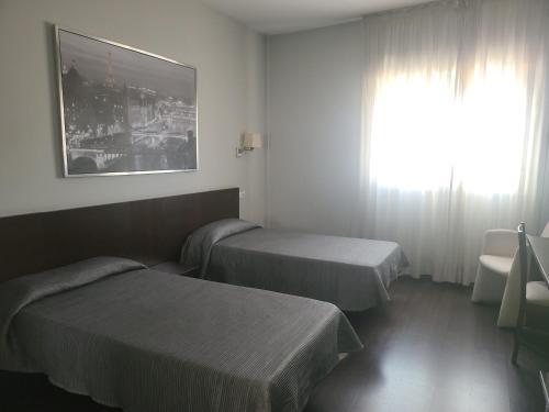 Habitación Doble - 2 camas del hotel T4. Foto 7