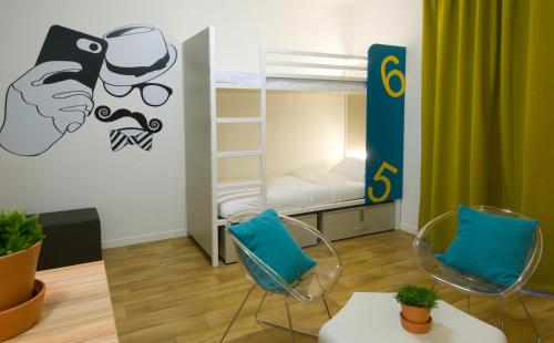 Habitación cuádruple del hotel Lodge In Paris 13. Foto 3