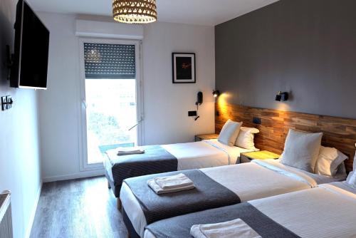 Habitación Cuádruple Confort del hotel Lodge In Paris 13. Foto 3