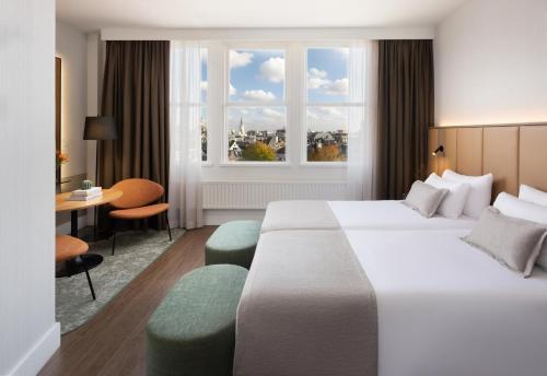 Habitación Doble Estándar con vistas a la ciudad - 1 o 2 camas del hotel Nh City Centre Amsterdam