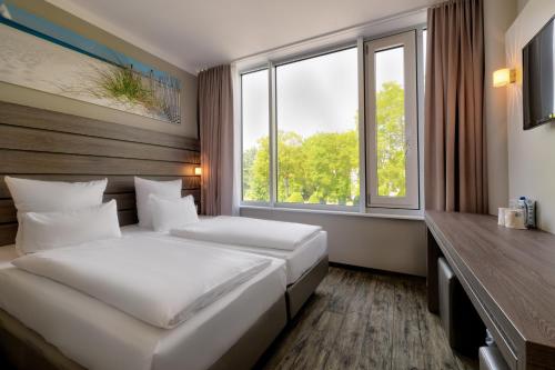 Habitación Estándar - 1 cama grande del hotel Tulip Inn München Messe. Foto 3