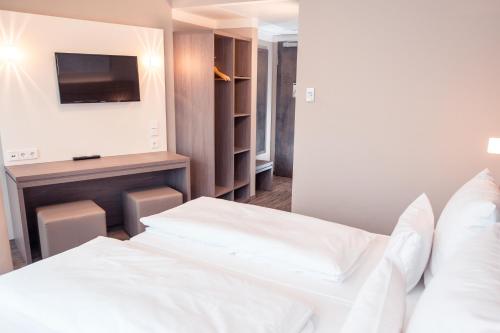 Habitación Doble Estándar - 2 camas del hotel Tulip Inn München Messe. Foto 1
