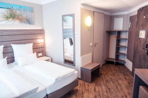 Habitación Doble Estándar - 2 camas del hotel Tulip Inn München Messe. Foto 3