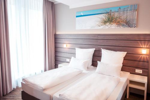 Habitación Doble Estándar - 2 camas del hotel Tulip Inn München Messe. Foto 4