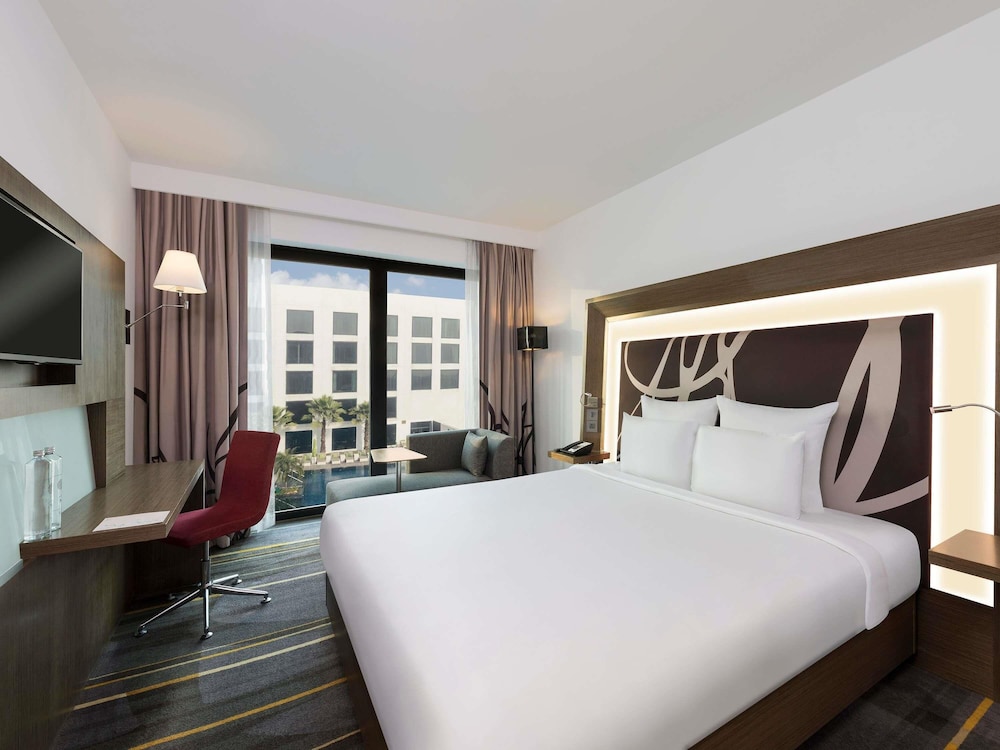 Habitación estándar, 1 cama de matrimonio grande del hotel Novotel New Delhi Aerocity. Foto 8
