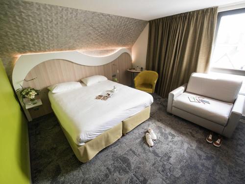 Habitación estándar con 1 sofá - cama individual del hotel Ibis Styles Saint Malo Port. Foto 1