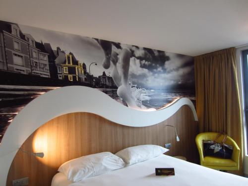 Suite familiar estándar con 1 cama doble y camas gemelas del hotel Ibis Styles Saint Malo Port. Foto 6