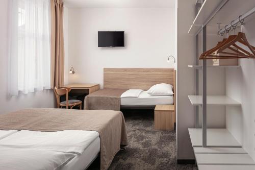 Habitación Doble Estándar con cama supletoria del hotel Ambiance