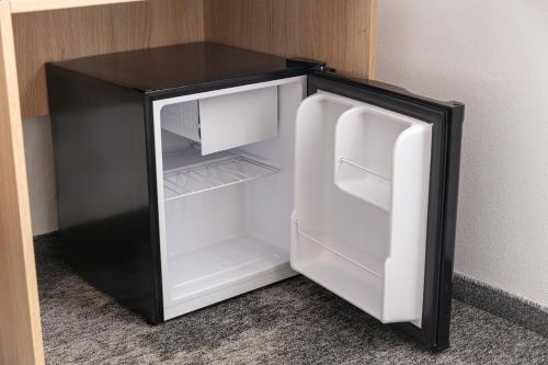 Habitación Doble Estándar con cama supletoria del hotel Ambiance. Foto 4