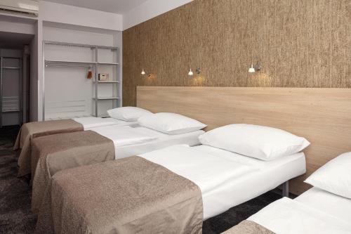 Habitación Triple Estándar con cama supletoria del hotel Ambiance