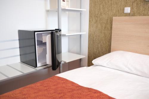 Habitación Triple Estándar con cama supletoria del hotel Ambiance
