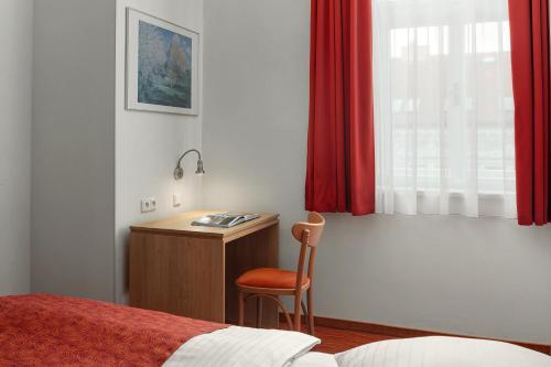 Habitación Triple Estándar con cama supletoria del hotel Ambiance. Foto 4
